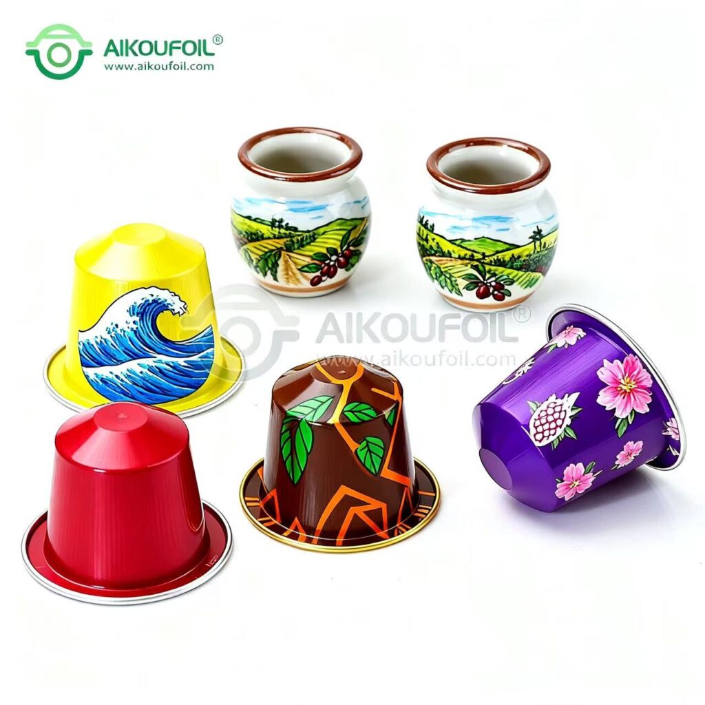 Custom-printed aluminium foil coffee capsules, showcasing brand logos and Pantone colour matching effects.