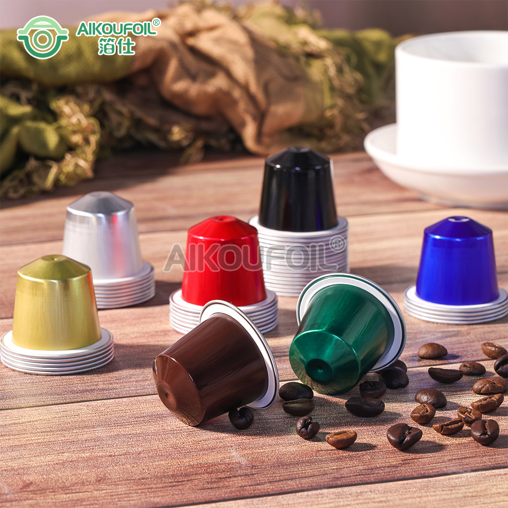 Various colors of Aikoufoil Nespresso compatible aluminum capsules.